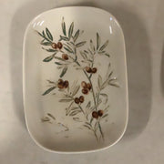 Stoneware dish with plant