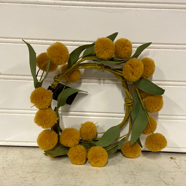Small yellow/orange pompon with green Eva leaves candle ring wreath