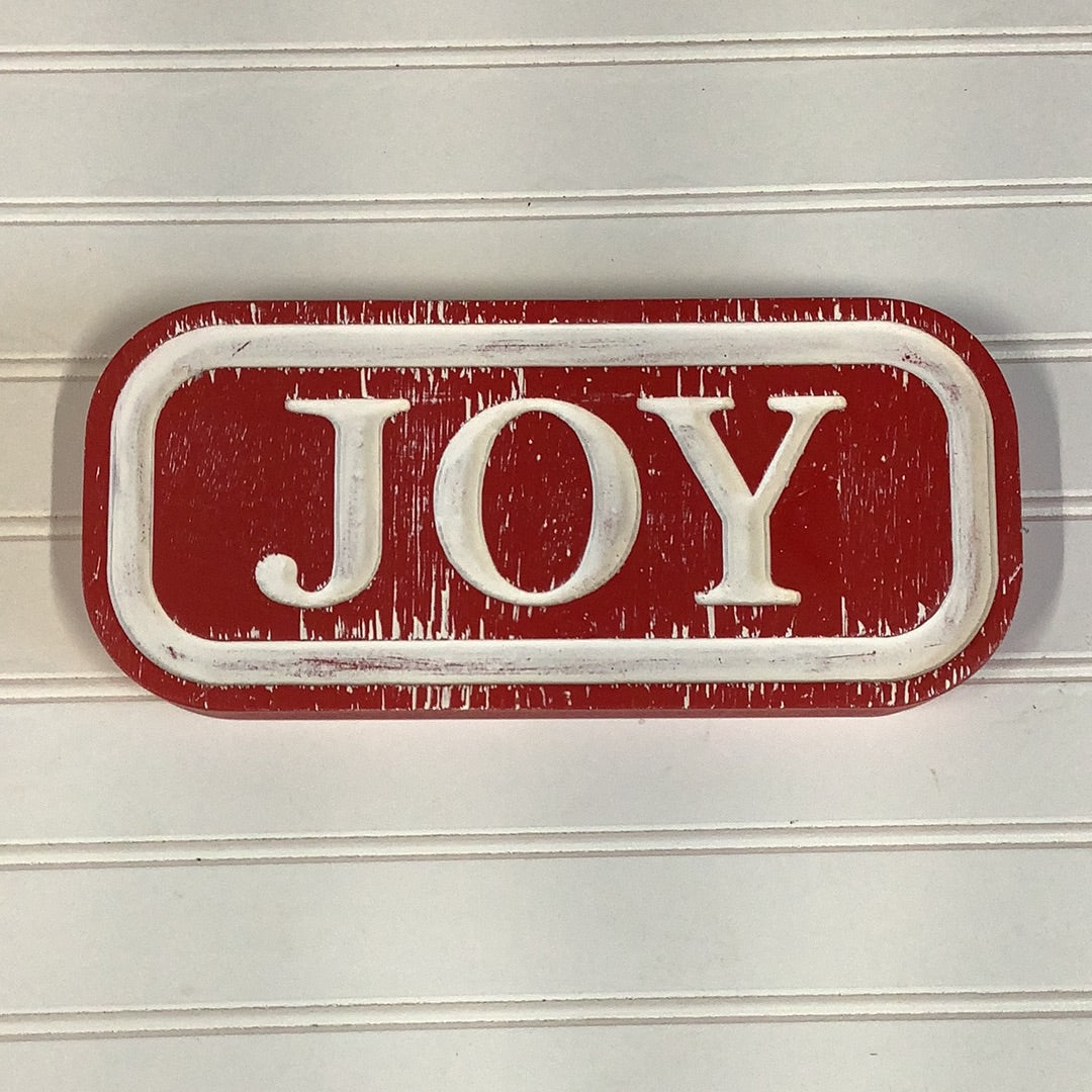 Red joy engraved sign