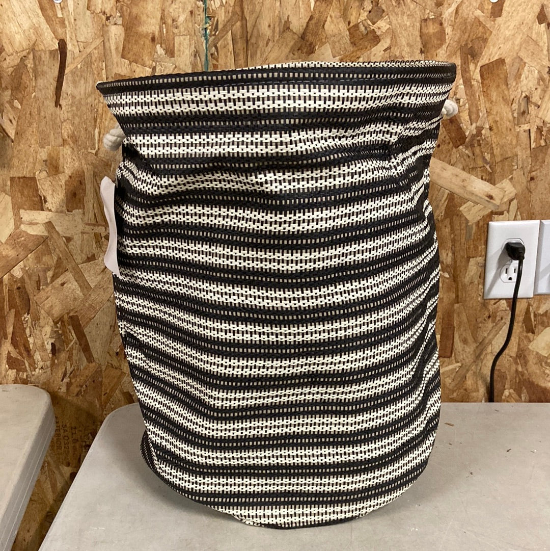 Black and white weaved round bin