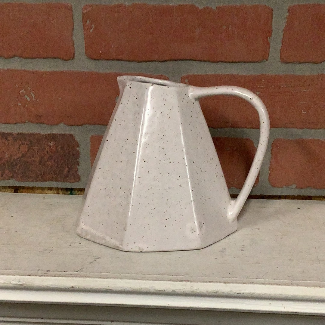 Stoneware pitcher with reactive glaze
